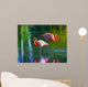 Two pink flamingos standing in the water. Stylized photo Wall Mural