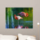 Two pink flamingos standing in the water. Stylized photo Wall Mural