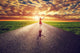 Happy Woman Jumping On Long Straight Road, Way Towards Sun Wall Decal