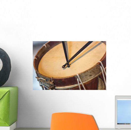 old military drum with black sticks Wall Mural