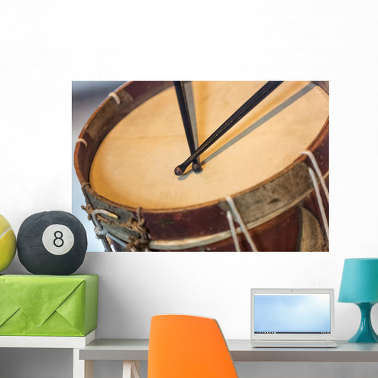 old military drum with black sticks Wall Mural