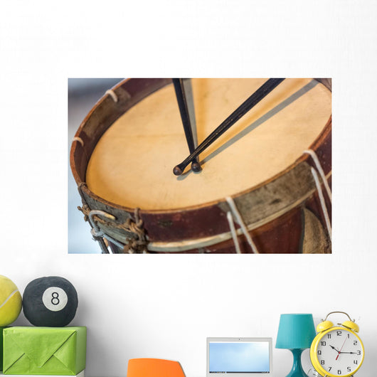old military drum with black sticks Wall Mural