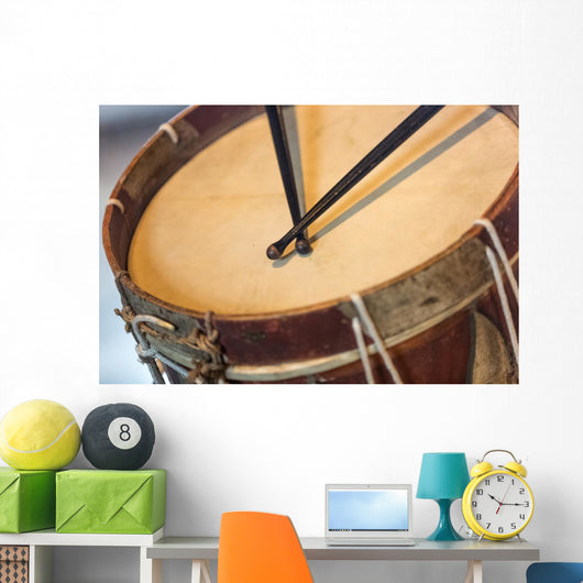 old military drum with black sticks Wall Mural