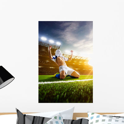 Soccer Player In Action Wall Decal 2 shown on a wall