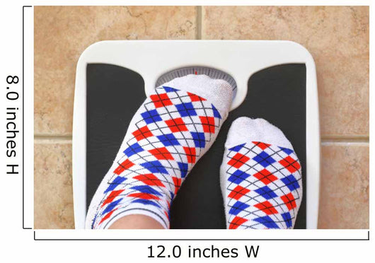 Woman's feet on bathroom scale. Diet concept Wall Decal