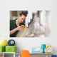 Male technician repairing agriculture machinery Wall Mural