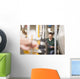 Male technician repairing agriculture machinery Wall Mural
