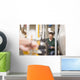 Male technician repairing agriculture machinery Wall Mural