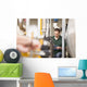Male technician repairing agriculture machinery Wall Mural