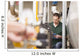 Male technician repairing agriculture machinery Wall Mural