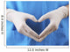 Doctor showing shape of heart by his hands in sterile gloves, Wall Mural