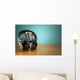 Vintage microphone and headphones on green background. Concept a Wall Mural