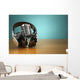 Vintage microphone and headphones on green background. Concept a Wall Mural