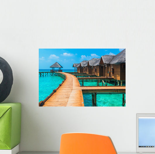 Over water bungalows with steps into amazing green lagoon Wall Mural