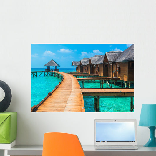 Over water bungalows with steps into amazing green lagoon Wall Mural