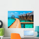 Over water bungalows with steps into amazing green lagoon Wall Mural