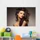 marvelous beautiful brunette posing in the studio - hair styling Wall Mural