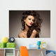 marvelous beautiful brunette posing in the studio - hair styling Wall Mural