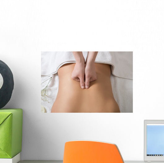 Woman Receiving Back Massage in Spa Center Wall Mural