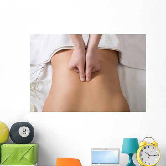 Woman Receiving Back Massage in Spa Center Wall Mural