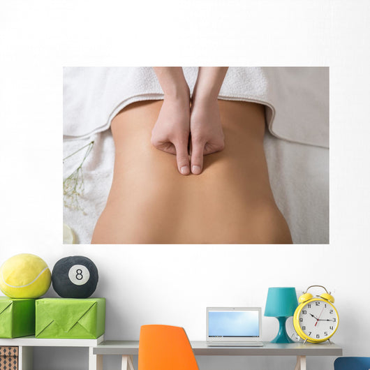 Woman Receiving Back Massage in Spa Center Wall Mural