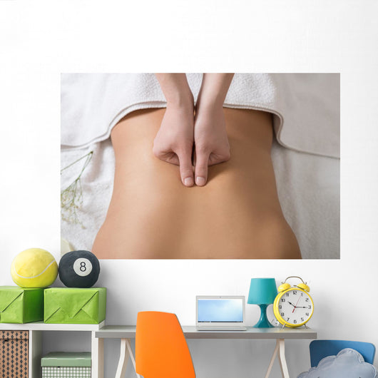 Woman Receiving Back Massage in Spa Center Wall Mural