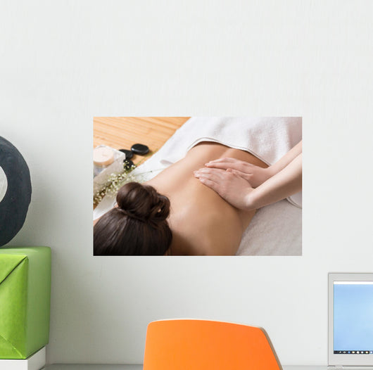 Woman Receiving Back Massage in Spa Center Wall Mural