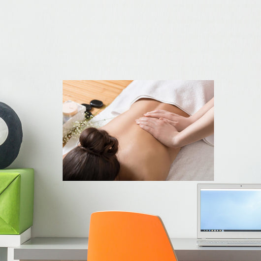 Woman Receiving Back Massage in Spa Center Wall Mural