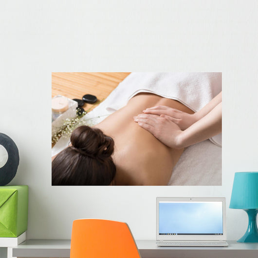 Woman Receiving Back Massage in Spa Center Wall Mural
