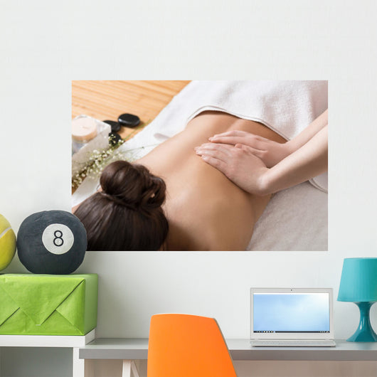 Woman Receiving Back Massage in Spa Center Wall Mural