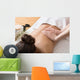 Woman Receiving Back Massage in Spa Center Wall Mural