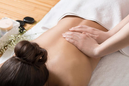 Woman Receiving Back Massage In Spa Center Wall Decal