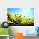 Planting Flowers in a garden Wall Mural