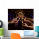 Clinking glasses of champagne in hands on lights background Wall Mural