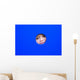 little kid playing peek-a-boo on a playground Wall Mural