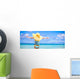 Little girl in big yellow hat on white sandy beach Wall Mural