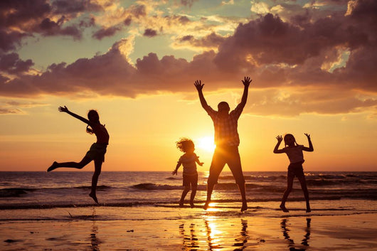 Father And Children Playing On The Beach Wall Decal