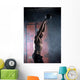 Beautiful athlete doing kettlebell swings. Profile picture. Athl Wall Mural