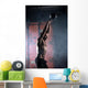 Beautiful athlete doing kettlebell swings. Profile picture. Athl Wall Mural