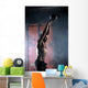 Beautiful athlete doing kettlebell swings. Profile picture. Athl Wall Mural