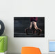 Athlete with naked torso doing push-ups on his hands while stand Wall Mural