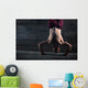 Athlete with naked torso doing push-ups on his hands while stand Wall Mural