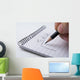 Close up of hand holding a pencil and writes the to do list Wall Mural