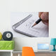 Close up of hand holding a pencil and writes the to do list Wall Mural