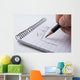 Close up of hand holding a pencil and writes the to do list Wall Mural