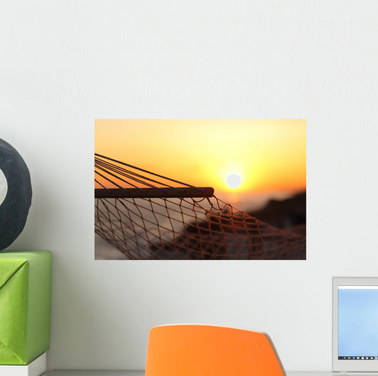 Close up of a hammock on the beach at sunset Wall Mural
