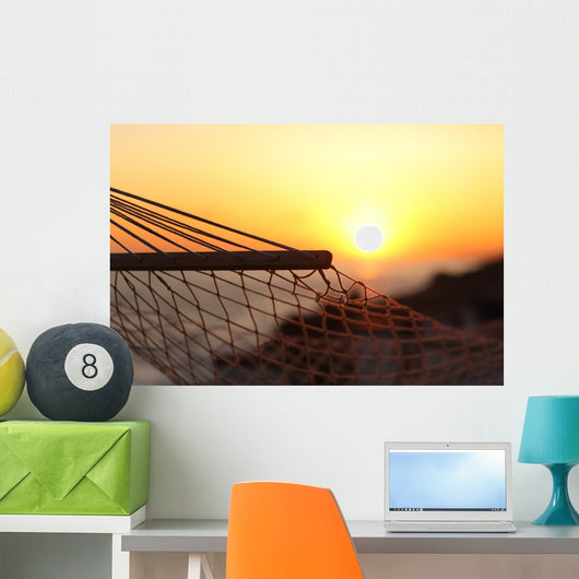 Close up of a hammock on the beach at sunset Wall Mural