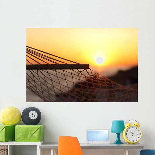 Close up of a hammock on the beach at sunset Wall Mural
