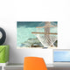 Travel concept with a hammock in a tropical beach Wall Mural