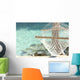 Travel concept with a hammock in a tropical beach Wall Mural